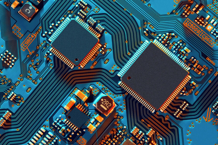 Close-up of a circuit board filled with various electronic components and connections.