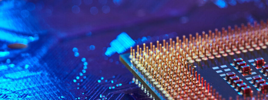 Close-up view of a computer chip showcasing its intricate circuits and components.
