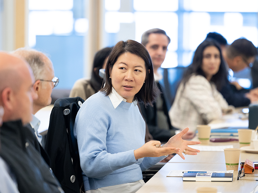 Amy Tong speaks to a conference audience at Berkeley Lab about quantum computing and cybersecurity.