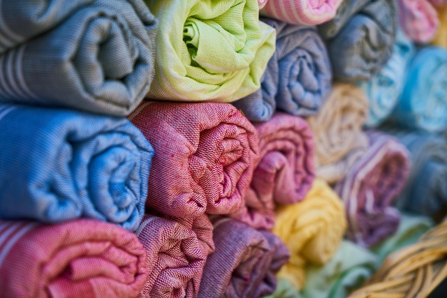 rolls of fabric stacked