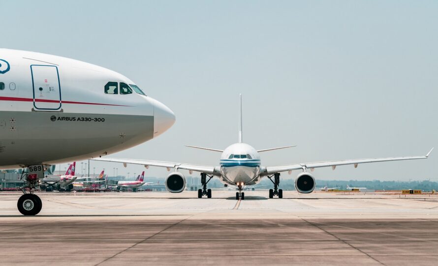 two airplanes on runway