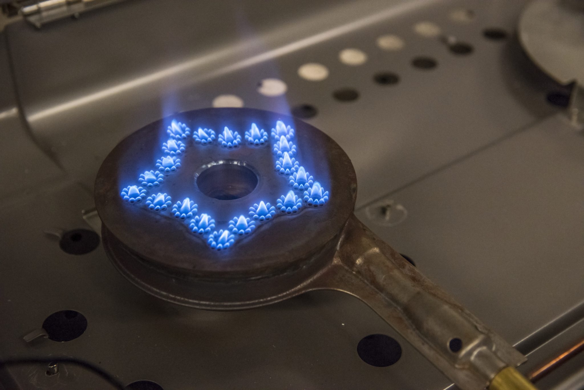 HighEfficiency, LowEmissions Premixed Flame Gas Burners with Flame